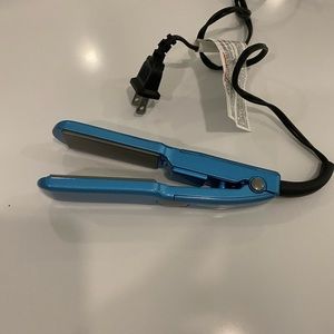 BaByliss Pro nano titanium travel sized flat iron.